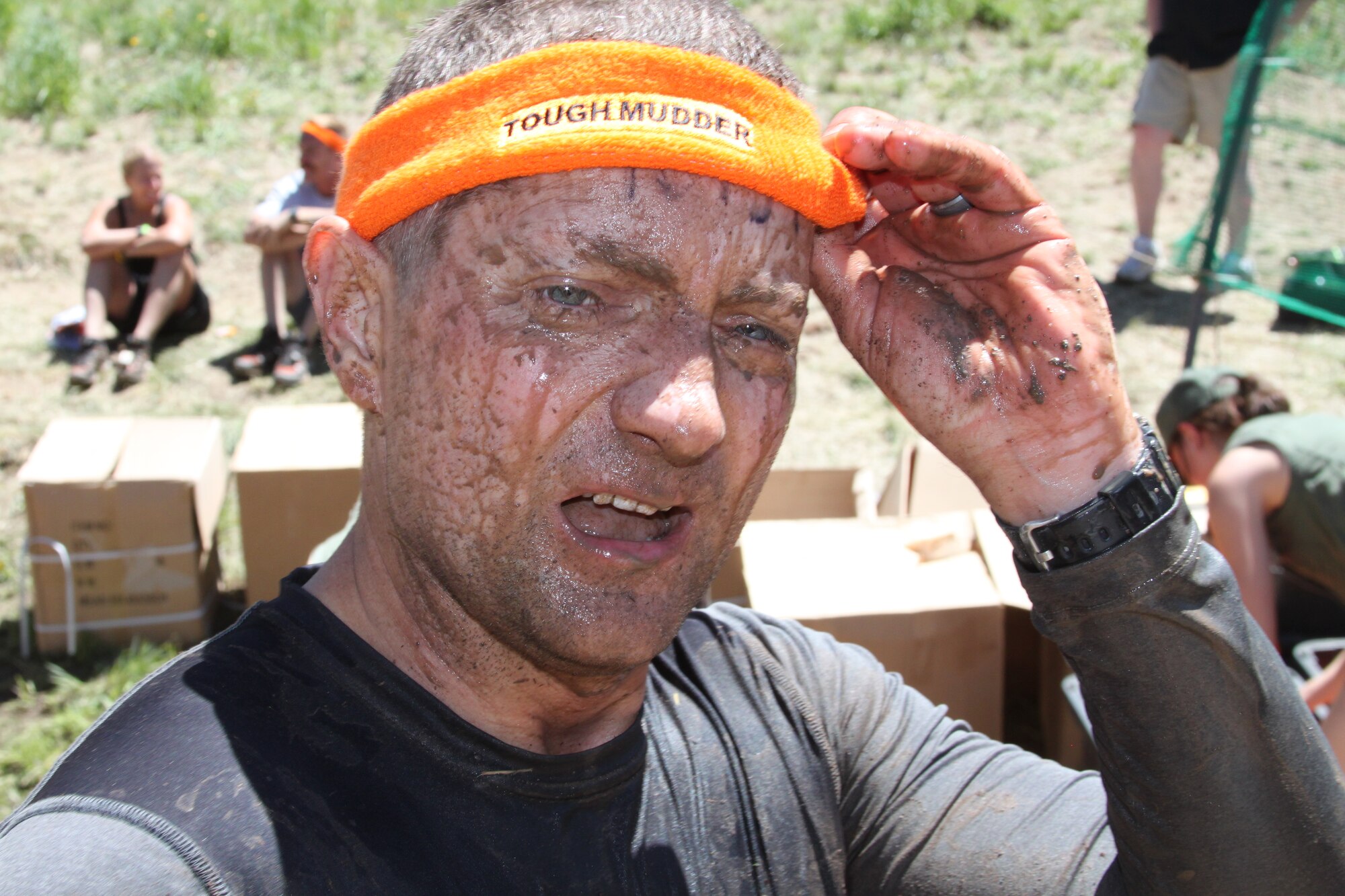 310th Space Wing member Senior Master Sgt. Peter Price, the chief of health services management, sighs a breath of relief after completing the Tough Mudder in Avon, Colo. on June 26. Price was among a group of seven members of the 310th Mission Support Group to complete the Tough Mudder challenge. (U.S. Air Force photo/Tech. Sgt. Scott P. Farley)