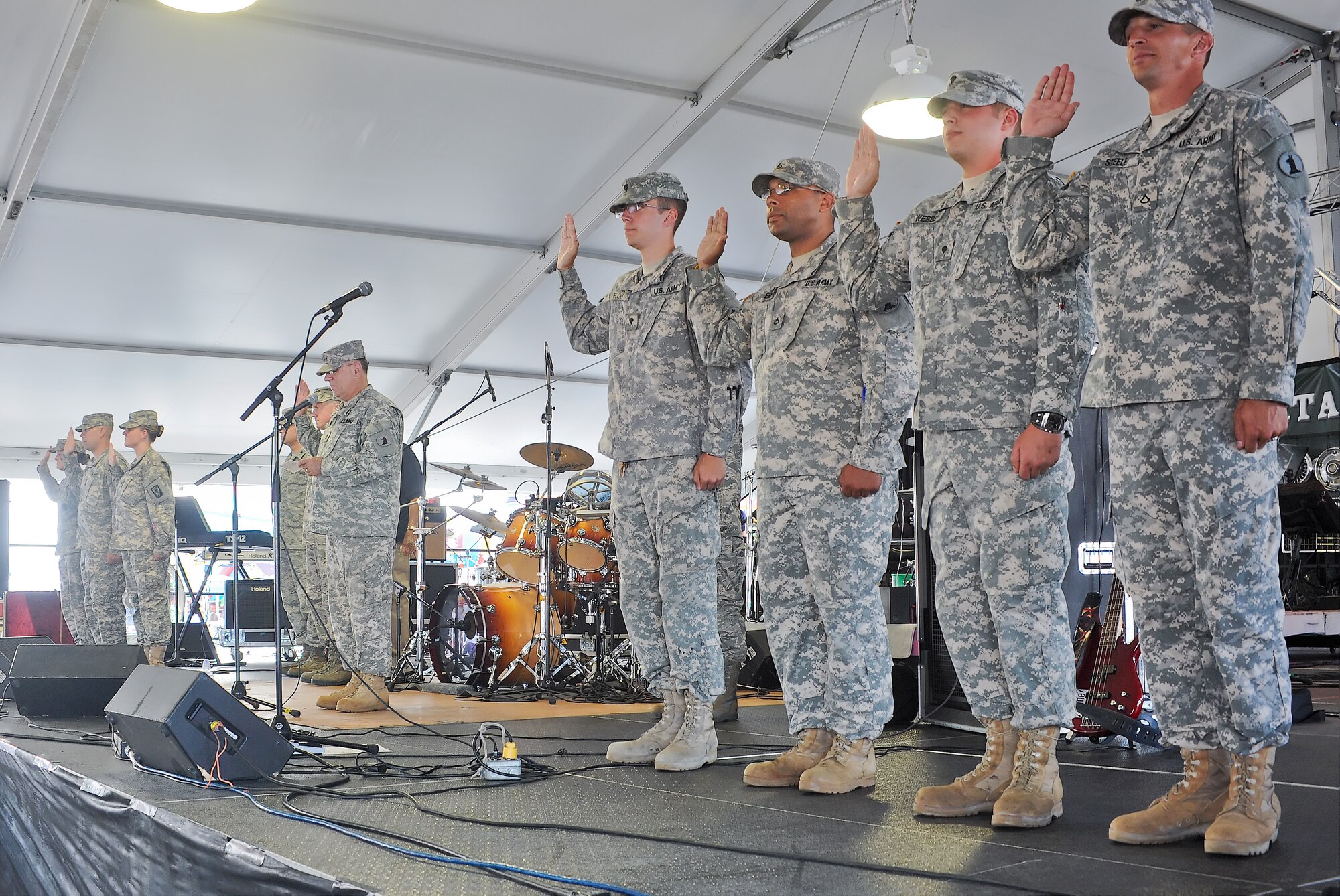 Army Maj. Gen. Frank Vavala, the Delaware Adjutant General, conducts a reenlistment ceremony for Delaware National Guard soldiers July 27, 2011, during the Delaware State Fair at Harrington, Del. The ceremony was one of many Armed Forces Day events held in appreciation of local service members. (U.S. Air Force photo by Airman 1st Class Samuel Taylor)   