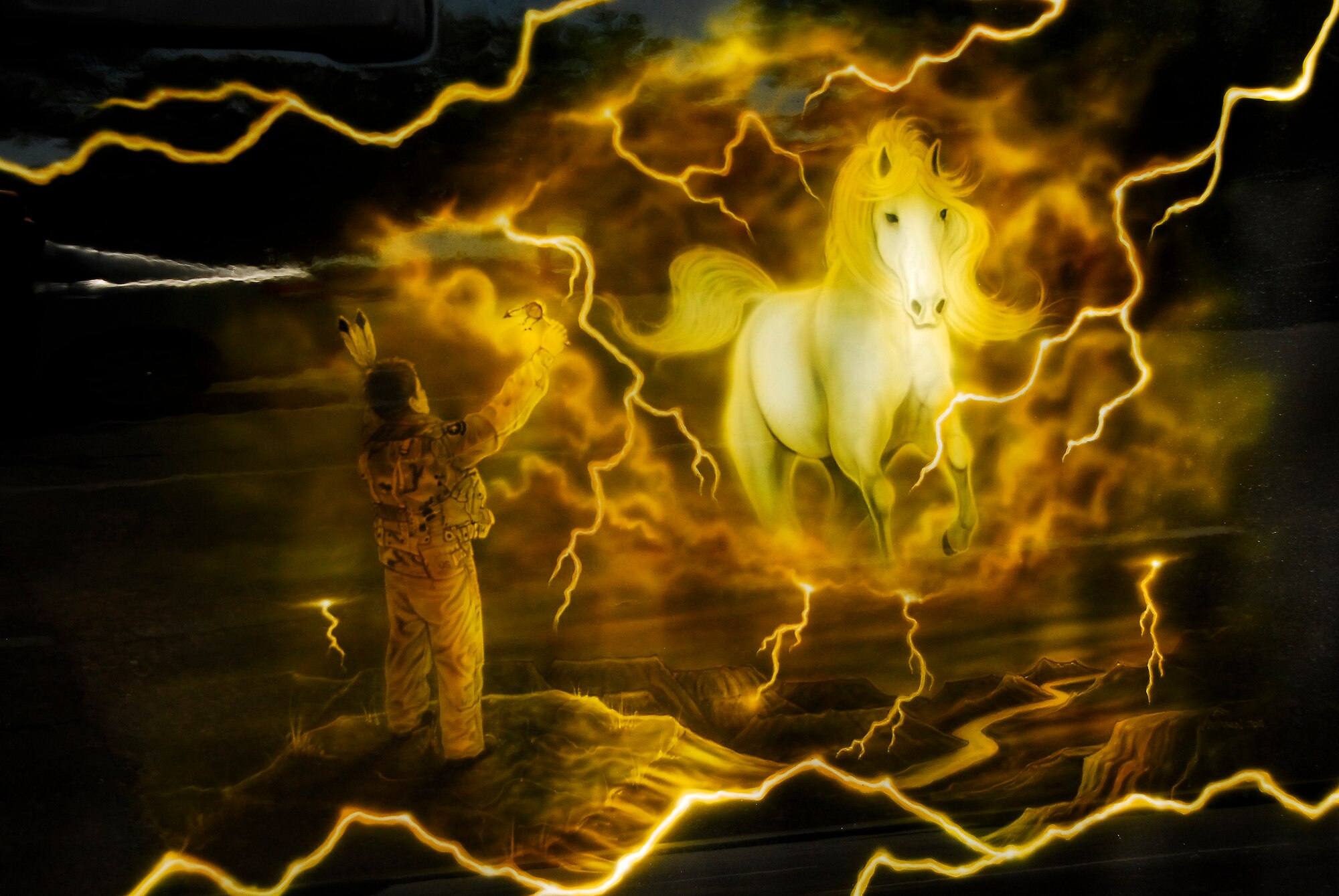 The custom images adorning Master Sgt. Caterina Durham’s 2009 HUMMER include a  spectral horse, a universal sign of strength, power, freedom and loyalty.