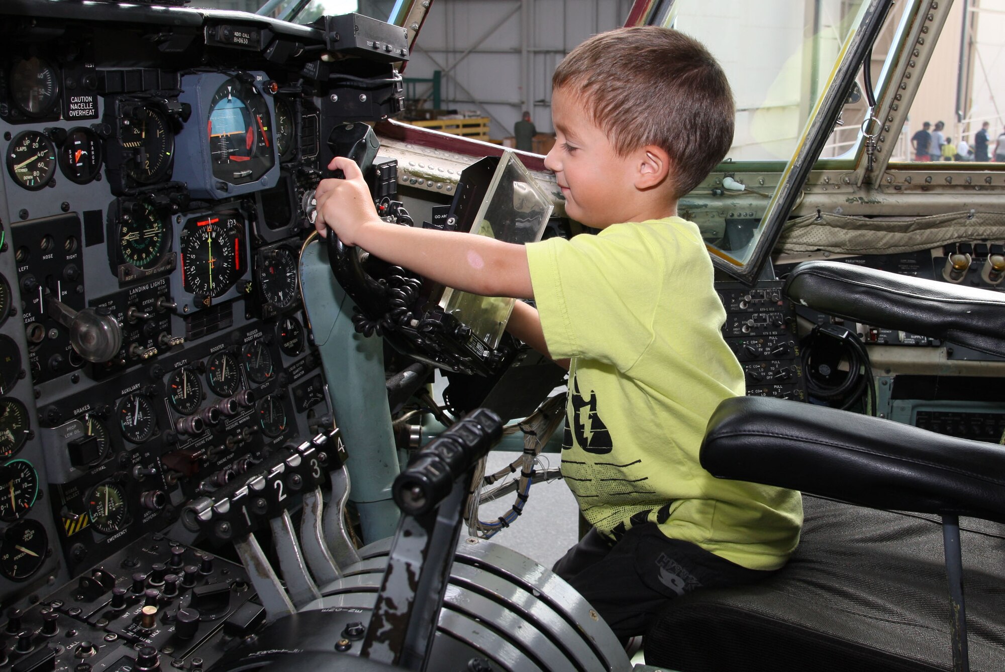 The C-130 static offered the opportunity for kids to try out the pilot and co-pilot seats. (U.S. Air Force Photo/Don Peek)