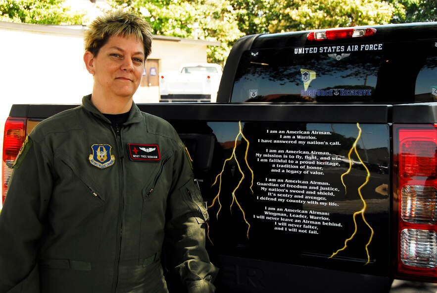 Master Sgt. Caterina Durham’s 2009 HUMMER pays tribute to her Native American heritage and military service with a series of custom paintings, such as “The Airman’s Creed,” framed by lightning, on the tailgate.