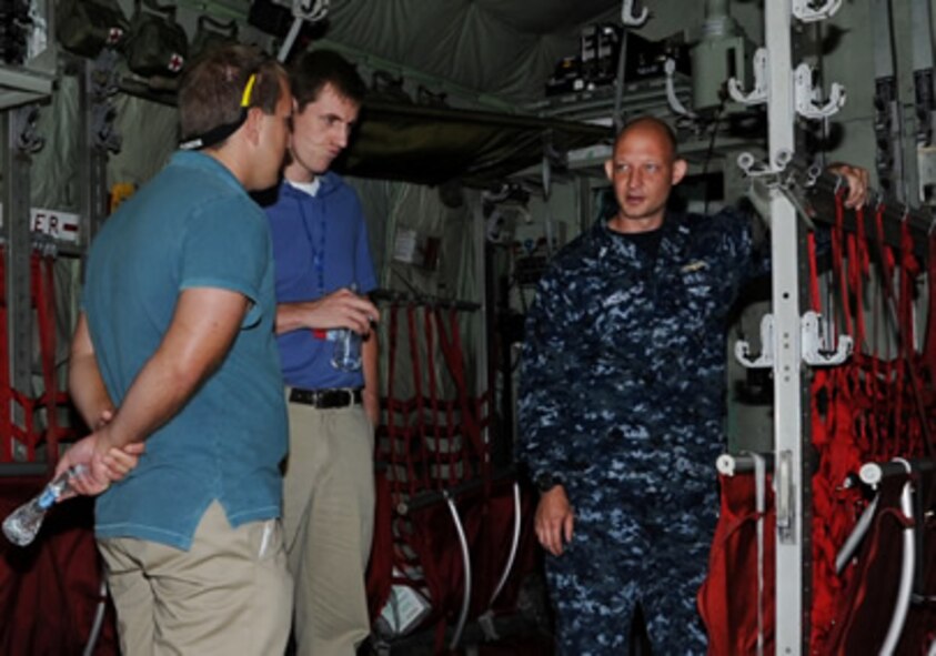 Science, Mathematics and Research for Transformation program participants tour the inside of a C-141 during the July orientation in Washington D.C.  (U.S. Air Force photo/Staff Sgt. Tiffany Trojca)