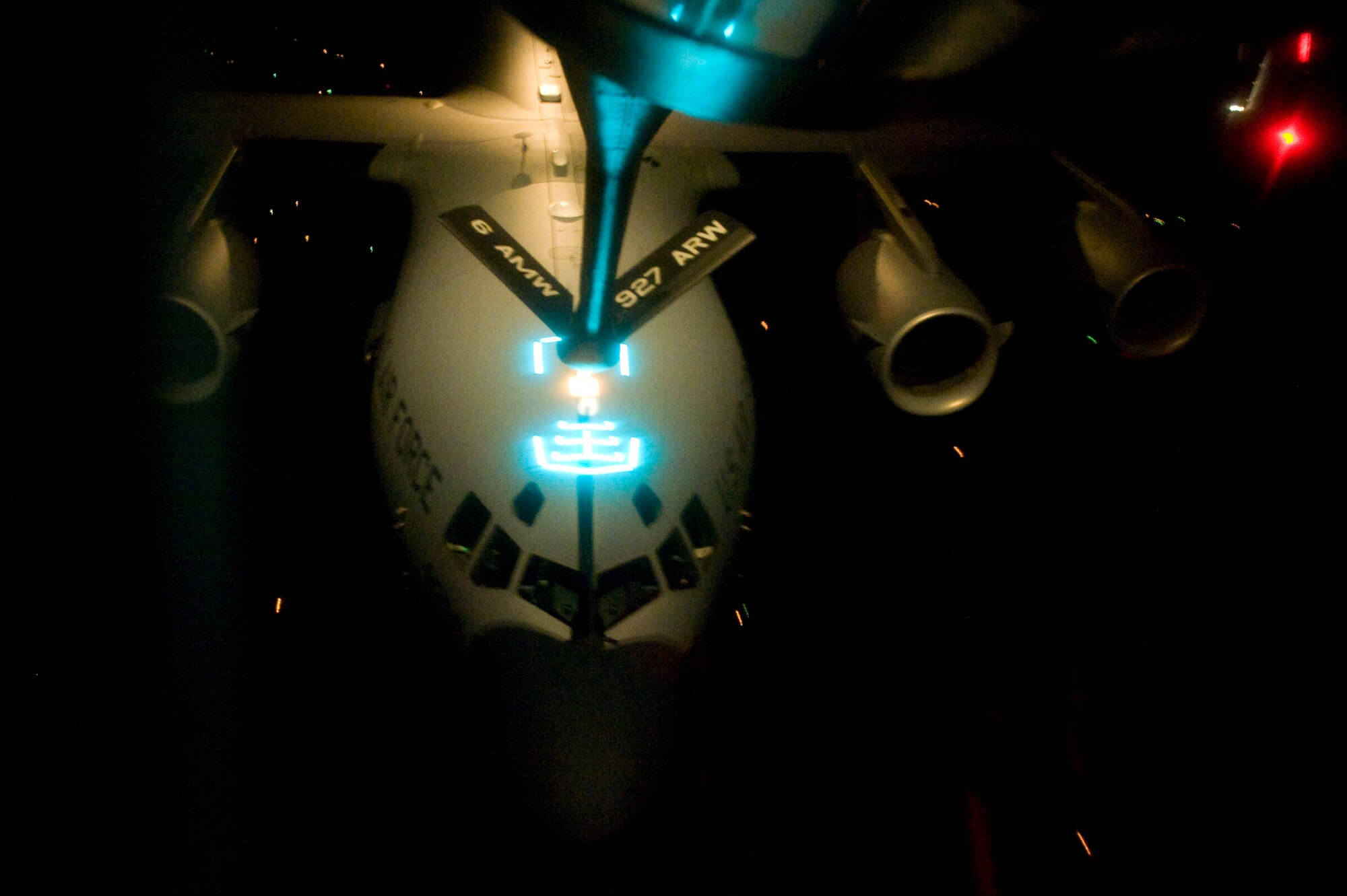 A C-17A Globemaster III recieves fuel from a KC-135 Stratotanker with the 927th Air Refueling Wing during Air Mobility Command's Rodeo 2011 at Joint Base Lewis-McChord, Wash., July 26, 2011. Rodeo is the U.S. Air Force's and AMC's premier international combat skills and flying operations competition designed to develop and improve techniques, procedures, and interoperability, while optimizing international mobility partnerships and enhancing mobility operations. (U.S. Air Force photo by SSgt. Greg C. Biondo) 
