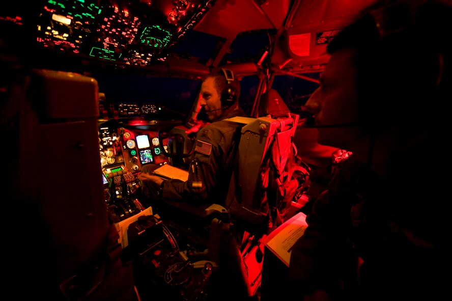 Major Zach Davidson, a KC-135 Stratotanker pilot with the 63rd Air Refueling Squadron conducts pre-aerial refueling checks during Air Mobility Command's Rodeo 2011 at Joint Base Lewis-McChord, Wash., July 26, 2011. Rodeo is the U.S. Air Force's and AMC's premier international combat skills and flying operations competition designed to develop and improve techniques, procedures, and interoperability, while optimizing international mobility partnerships and enhancing mobility operations. (U.S. Air Force photo by SSgt. Greg C. Biondo)