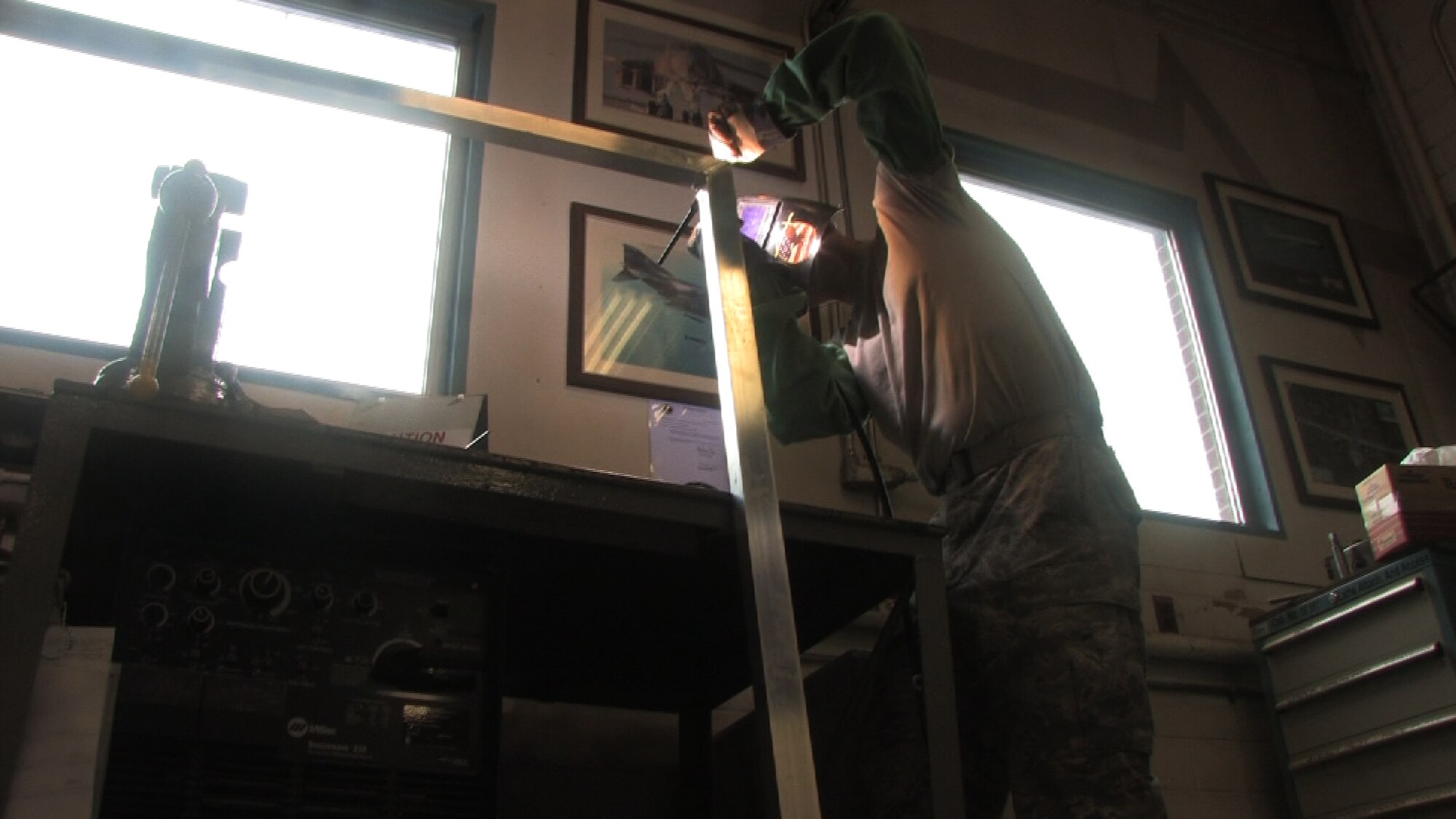 Staff Sgt. David Larva, 934th aircraft metal technologist, welds a Civil engineer gate door while on seasoning training.  Seasoning training gives Reservists who are recent technical school graduates the chance to receive on the job training for up to 90 days. (Air Force Photo/Wendy Cormier) 
