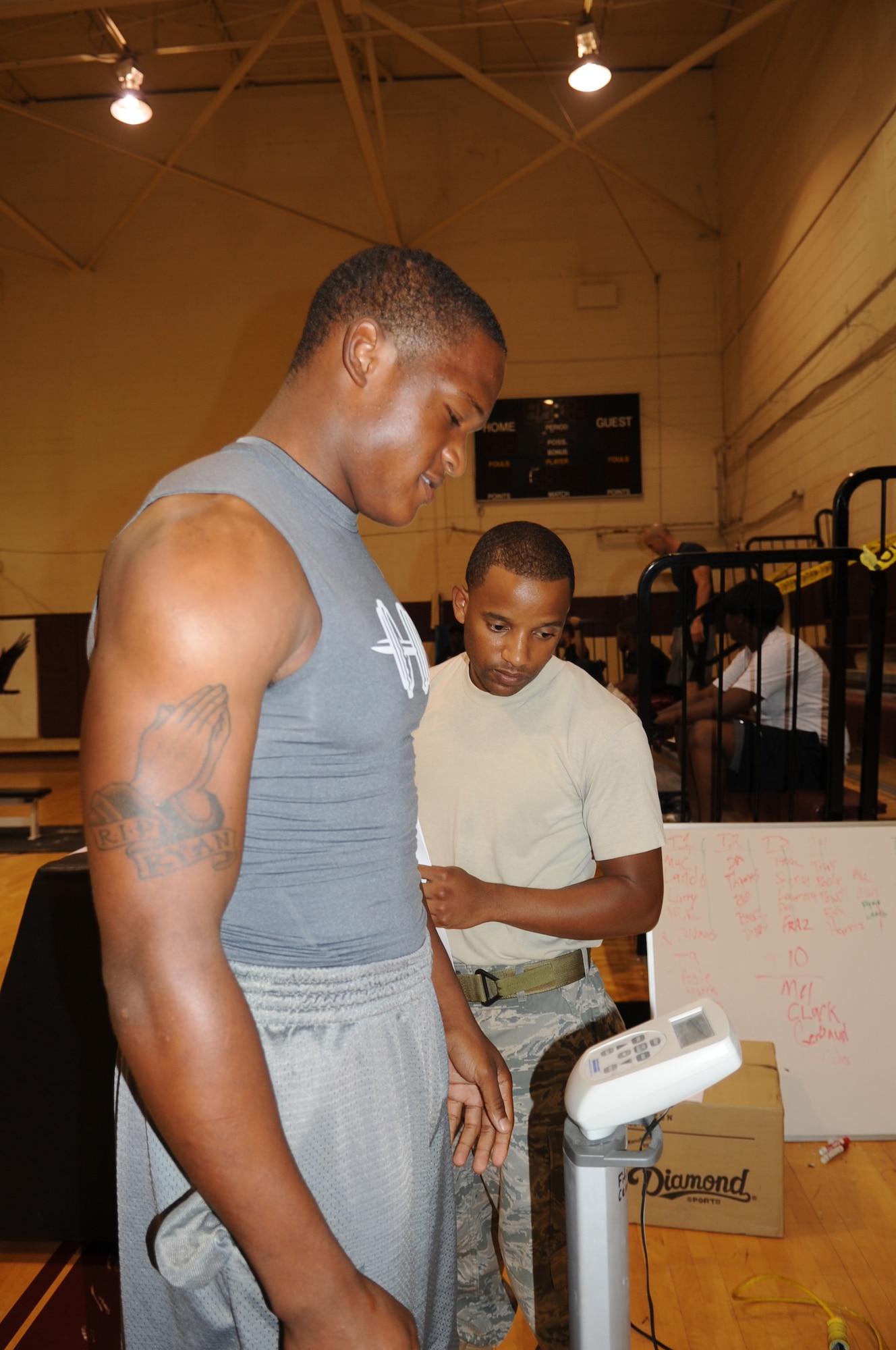 SEYMOUR JOHNSON AIR FORCE BASE, N.C. - Airman 1st Class Cory Jenkins, 334th Aircraft Maintenance Unit crew chief, weighs in during the bench press competition here July 28, 2011. The fitness center hosted the competition to encourage Airmen to live a healthy lifestyle. Jenkins hails from Slidell, La. (U.S. Air Force photo by Senior Airman Gino Reyes/Released)