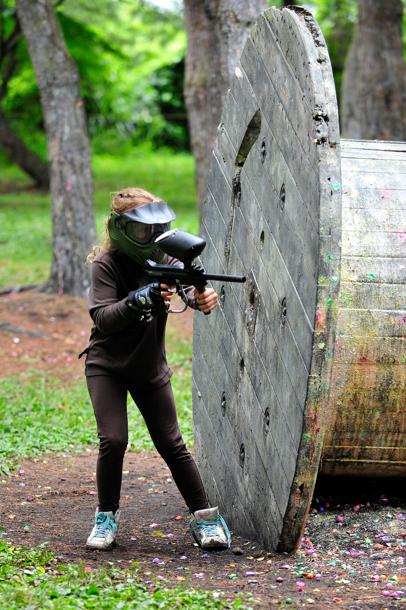 MISAWA AIR BASE, Japan -- Samantha Kandle, daughter of Capt. Justin Kandle, 35th Medical Surgical Squadron, is the last one standing on her team as she picks off opponents one by one during the first day of Youth Paintball Summer Camp, Aug. 1. The camp is open to children and teenagers ages 8 to 18, and teaches how to safely play the game of paintball while learning life lessons, such as, overcoming fear, making friends and team work. (U.S. Air Force photo/Staff Sgt. Nathan Lipscomb/Released)