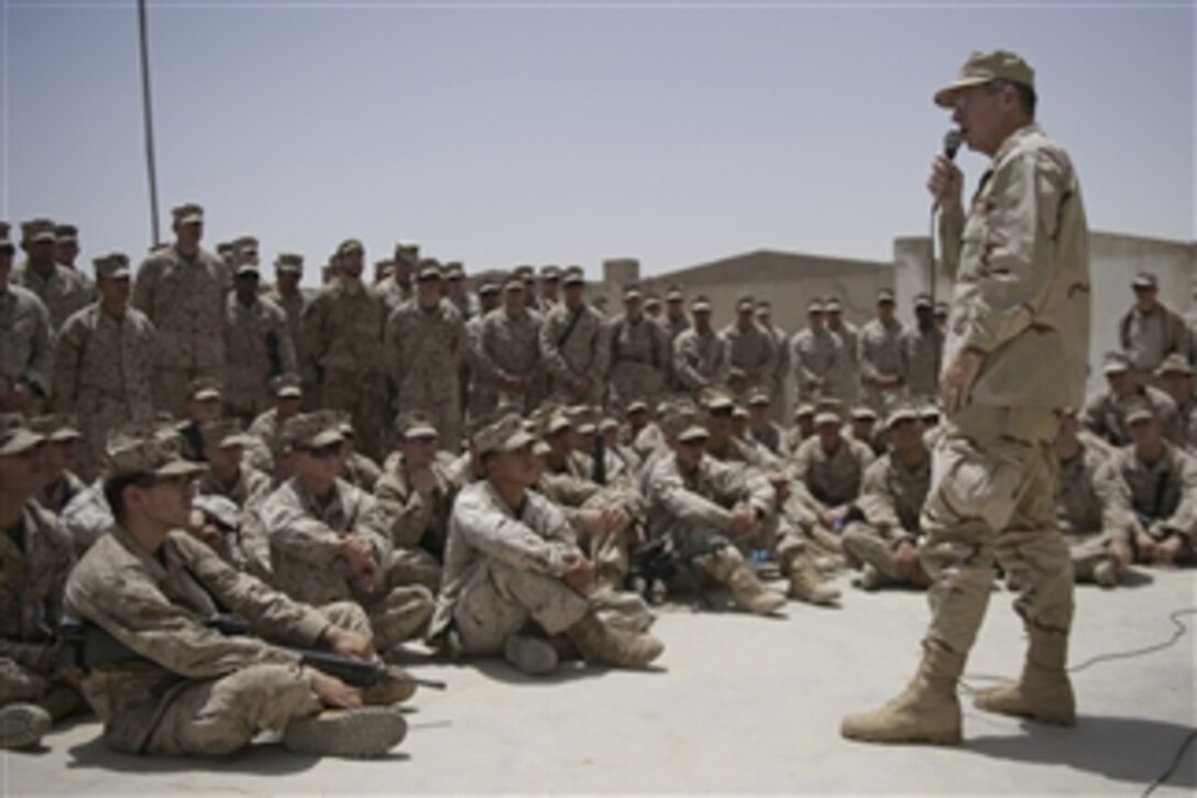 Chairman of the Joint Chiefs of Staff Adm. Mike Mullen addresses U.S. Marines assigned to Forward Operating Base Jackson, Afghanistan, on July 30, 2011.  Mullen is on a five-day USO tour with comedian Jon Stewart, NBA legend Karl Malone and magician David Blane visiting troops in Afghanistan and Iraq.  