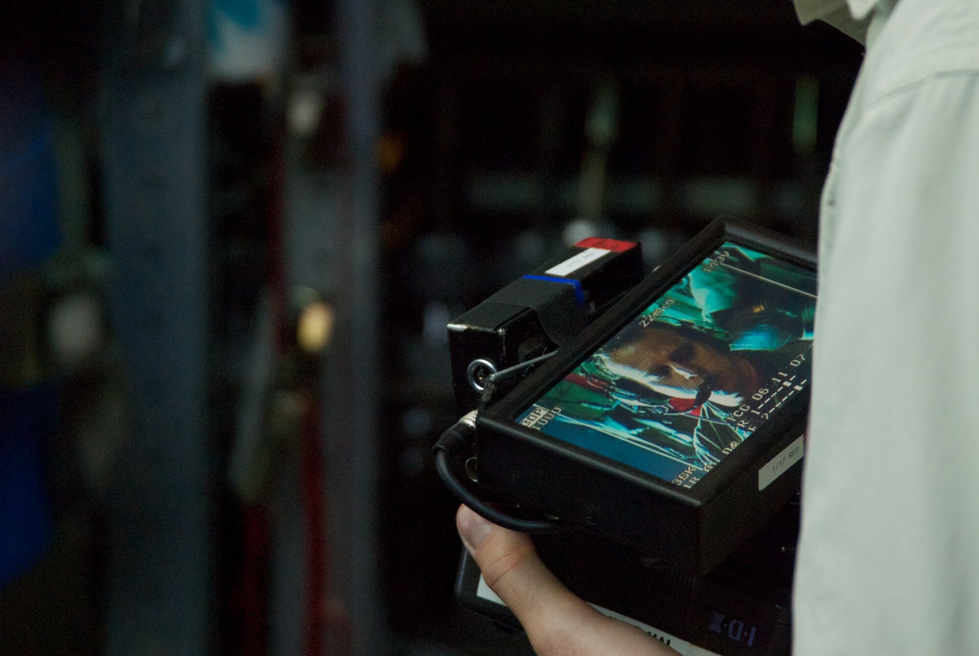 Capt. Kyle Larson, 53rd Weather Reconnaissance Squadron Aerial Reconnaissance Weather Officer, is "interviewed" about the training he received while flying a mission into Tropical Storm Don July 29. (U.S. Air Force photo by Capt. J. Justin Pearce)