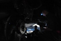 MINOT AIR FORCE BASE, N.D. -- Staff Sgt. Jordan Ellis, 5th Aircraft Maintenance Squadron aircraft armament systems technician and Tech Sgt. Iickyra Jones, 5th AMXS aircraft armament systems team chief, examines for visual defects and proper installation of systems components during a routine inspection of a B-52 Stratofortress, here Aug. 3. Aircraft armament systems technicians plan, organize and direct maintenance activities by performing armament systems maintenance functions tests before connecting electrically actuated explosives and propellants to effectively achieve mission success. (U.S. Air Force Photo/Senior Airman Jesse Lopez) 