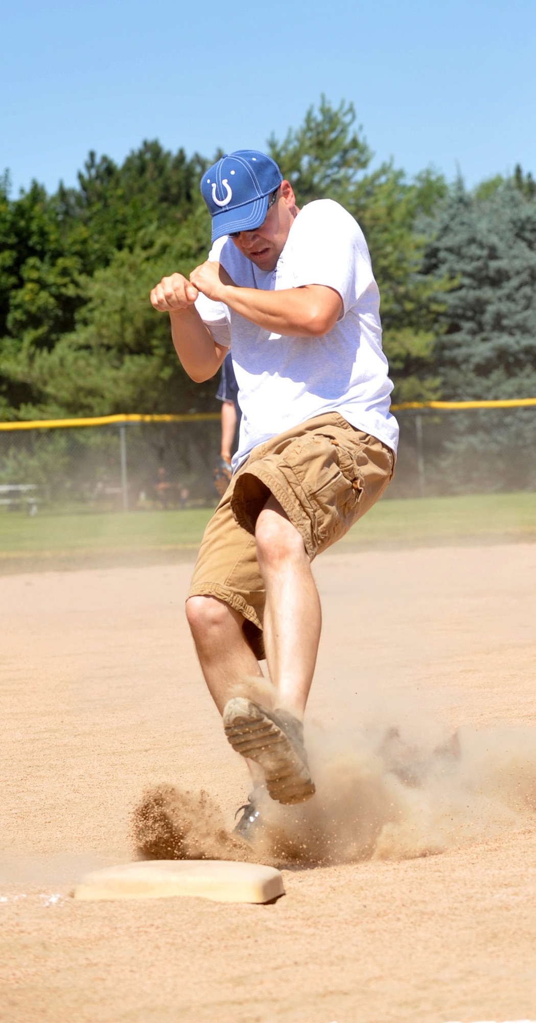 MOUNTAIN HOME AIR FORCE BASE, Idaho  – Master Sgt. Eric Dye, 366th Security Forces Squadron first sergeant, runs to third base during the Operation Warmheart softball tournament here, July 29. Operation Warmheart was developed to help Airmen and their families who may be having financial struggles. (U.S. Air Force photo by Airman 1st Class Heather Hayward)