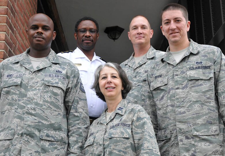 From left to right, Tech. Sgt Freddie Mims, 11th Civil Engineer Squadron SABER project manager; Mr. Chris Parks, 11th CES assistant fire chief; Capt. Deb Santos, 779th Medical Group disease manager; Master Sgt. Paul Grugin, 11th CES first sergeant and Senior Airman Mauro Bueno, 11th CES power production apprentice. They represent five of the 11 warriors of the week who organized and executed this year’s 1st Annual Motorcycle Safety Day. Simplified acquisition (Photo by Bobby Jones) 