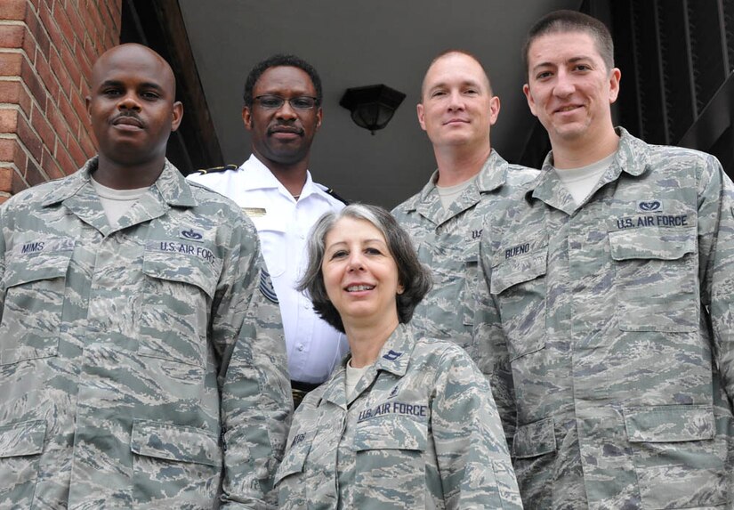From left to right, Tech. Sgt Freddie Mims, 11th Civil Engineer Squadron SABER project manager; Mr. Chris Parks, 11th CES assistant fire chief; Capt. Deb Santos, 779th Medical Group disease manager; Master Sgt. Paul Grugin, 11th CES first sergeant and Senior Airman Mauro Bueno, 11th CES power production apprentice. They represent five of the 11 warriors of the week who organized and executed this year’s 1st Annual Motorcycle Safety Day. Simplified acquisition (Photo by Bobby Jones) 