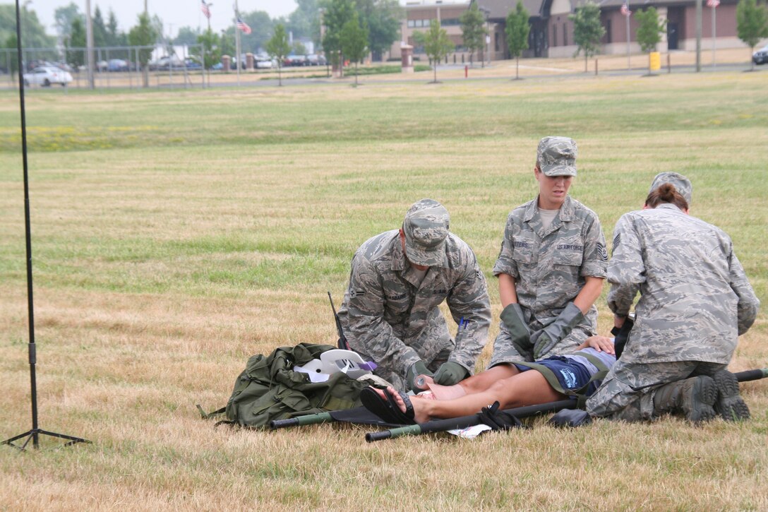 914th Aeromedical Staging Squadron Airmen participate in a mass casualty exercise during the July Unit Training Assembly at the Niagara Falls Air Reserve Station, N.Y.  July 25.To ensure readiness for the upcoming 2011 Thunder of Niagara Air Show, the exercise consisted of medical teams responding to multiple scenarios that could happen at any public event on base.  (U.S. Air Force courtesy photo by Tech Sgt. Jaimelynn Winkler)