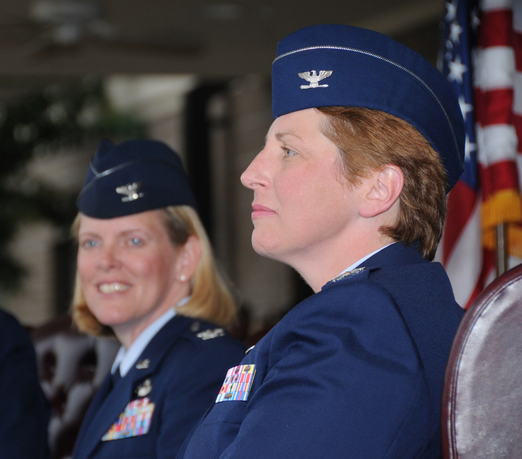 Col. Lynn Connett, left, turns over command of the 81st Training Group to Col. Maureen Smith July 28 on the parade field. Connett returns to the Pentagon as deputy director for manpower and personnel plans and integration for the Air Staff.  (U.S. Air Force photo by Kemberly Groue)