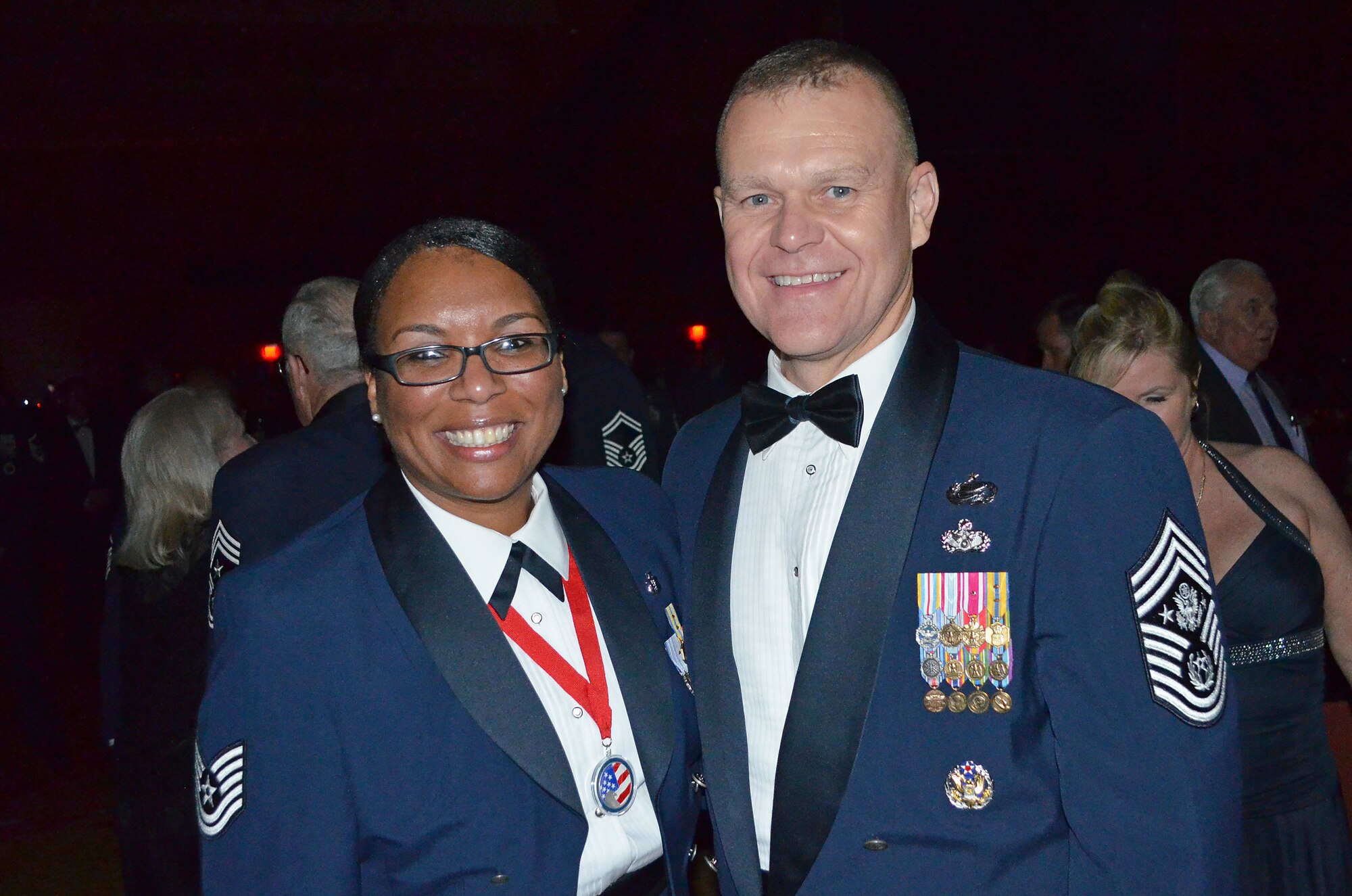 SEYMOUR JOHNSON AIR FORCE BASE, N.C. -- Recently-promoted Master Sgt. Nina Anderson poses with Chief Master Sgt. of the Air Force James Roy after being named the Air Force Sergeant’s Association International NCO of the Year at the Professional Airmen’s Conference gala July 27, 2011, in San Antonio. (Courtesy photo)