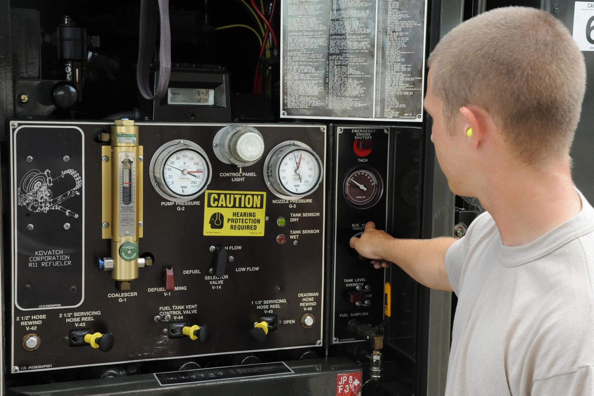 SEYMOUR JOHNSON AIR FORCE BASE, N.C.- Airman 1st Class Christian Crider monitors the controls on a defueling operation panel here Aug. 1, 2011. The 4th Logistics Readiness Squadron (LRS) fuel operations flight supports the base's F-15E Strike Eagle and KC-135R Stratotanker fleet. Crider is a 4th LRS fuels operator and hails from Montgomery, Ala. (U.S. Air Force photo by Senior Airman Whitney Lambert/ Released)