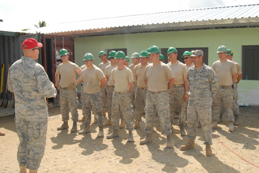 PARAMARIBO, SURINAME - Lt. Col. John Blackwell talks to members of the 114th Civil Engineer Squadron on their last day of construction of the Alkmaar Clinic here July, 9th 2011 (Air Force Photo by Master Sgt. Christopher Stewart)(Released)