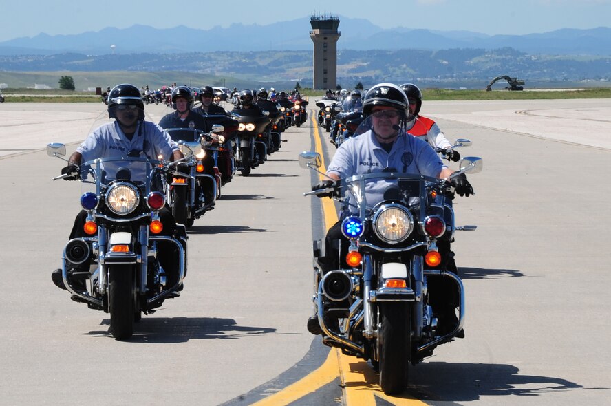 Motorcyclists ride down the runway at Ellsworth Air Force Base, S.D., Aug. 10, 2010 during last year’s Dakota Thunder Run. Registration for the 2011 event begins at 7:30 a.m. Aug. 9, 2011 at the Box Elder Police Department. (U.S. Air Force photo/Airman 1st Class Anthony Sanchelli/Released.)