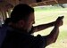 One of the firing competitors takes aim downrange during the Det. 340, MacDill AFB, Fla., law enforcement day March 18. More than 60 LE and state agencies were represented at the event, including prosecutors, judges, federal agents and local police officers, to name a few. The participants competed in a golf event and later in small-arms target shooting at MacDill’s Combat Arms and Maintenance range. (U.S. Air Force Photo)