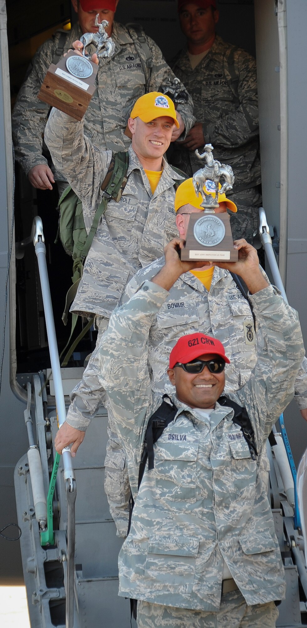 Rodeo teams were welcomed home by friends, family and fellow servicemembers
at an arrival ceremony Saturday.

The 621st Contingency Response Wing  and Team McGuire Security Forces teams
were named the best in their  respective categories at Air Mobility Rodeo
2011. 
Other JB MDL victories include: Best Security Forces Combat Tactics (Team
McGuire), Best Advanced Designated Marksmen (621 CRW), Best Joint Inspection
(621 CRW), Best KC-10 Aircrew Cargo Load (Team McGuire), Best SPICE (621
CRW) and Best HELAMS (621 CRW). (U.S. Air Force Photo by Kimberly
Wright/Released)