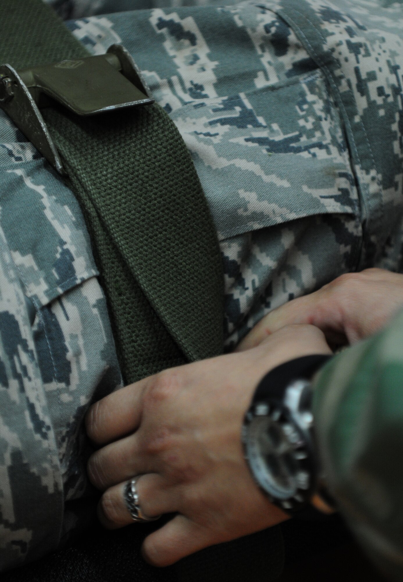 SPANGDAHLEM AIR BASE, Germany – A Saber Airman secures an individual to a stretcher during self aid and buddy care hands-on training here July 28. The training took place to ensure service members are prepared for potential deployments, local disasters, humanitarian missions and homeland attacks. (U.S. Air Force photo/Airman 1st Class Matthew B. Fredericks)