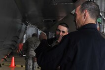 KUNSAN AIR BASE, Republic of Korea -- Col. Scott Pleus, 8th Fighter Wing commander, works beside Airmen in the phase inspection section of the Maintenance Squadron here August 2. Col. Pleus visited each section of the Maintenance Group as part as his Immersion tour of the base. (U.S. Air Force photo/Senior Airman Brittany Y. Bateman)