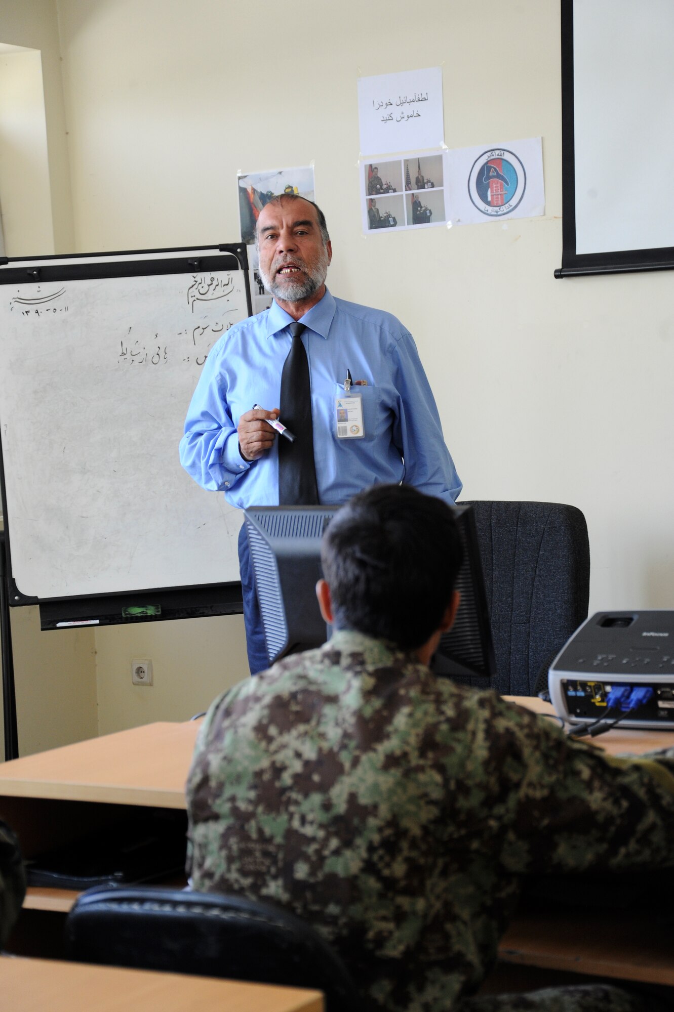 An Afghan instructor teaches a course at Pohantoon-e-Hawayee, the Afghan Air Force’s “Air University,” August 2, 2011. PeH is located on the Afghan Air Force compound in Kabul and currently has 593 students enrolled from all over Afghanistan in various classes and is the primary in-processing point for all training conducted in the AAF. (U.S. Air Force photo by Staff Sgt. Matthew Smith)