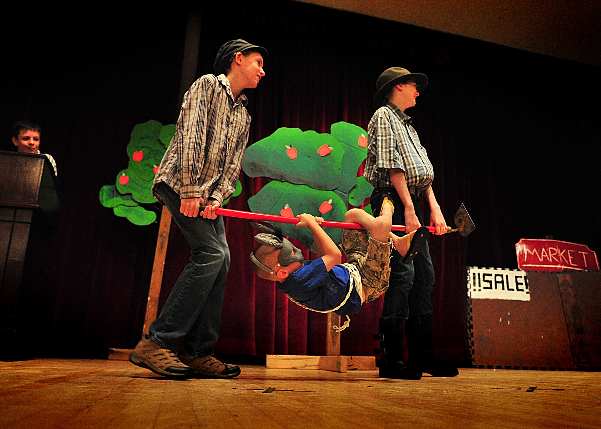 Children from the Osan Children's Theater rehearsed for their performances here, adaptations of two African folktales; 'A Caterpillar's Voice' and 'A Donkey to Market'. The children have been working toward their upcoming performance five days a week for two weeks. Mrs. Kim Adams coordinated the event so that childre, during their summer break have the opportunity to participate in performing arts. In between takes the children played a game called 'typewriter.' This game consisted of one child building a [make believe] story for the rest of the children to act out, which helped sharpen both acting and directing skills.  (U.S. Air Force Photo by/Staff Sgt. Daylena Gonzalez