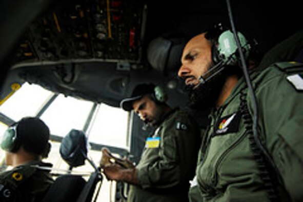 Members of the Pakistan air force fly a training mission to prepare for Rodeo 2011 at Joint Base Lewis-McChord, Wash., July 22, 2011.  Air Mobility Rodeo is the U.S. Air Force's and Air Mobility Command’s premier international combat skill and flying operations competition designed to develop and improve techniques, procedures and interoperability, while optimizing international mobility partnerships and enhancing mobility operations..  (U.S. Air Force Photo Staff Sgt. Eric Harris)