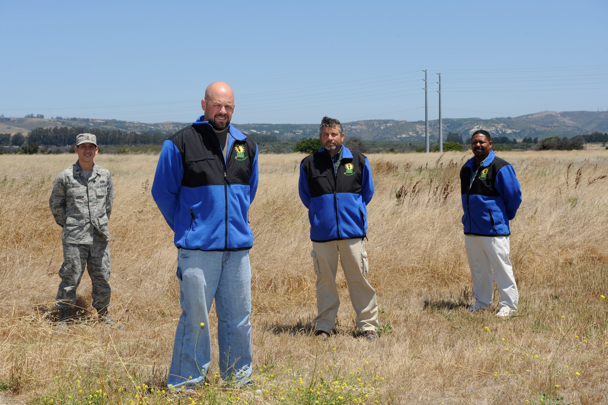 VANDENBERG AIR FORCE BASE, Calif. -- The winners of the Federal Energy and Water Management Program and Team Award, 2nd Lt. Julian Viana, Brad King, Scott Bly and Purnell Rush, of the 30th Civil Engineer energy management team, pose for a photo here Thursday, Aug. 4, 2011.  Mr. King and his team earned the award for their contributions to reducing energy consumption on base.  (U.S. Air Force photo/Staff Sgt. Andrew Satran) 

 