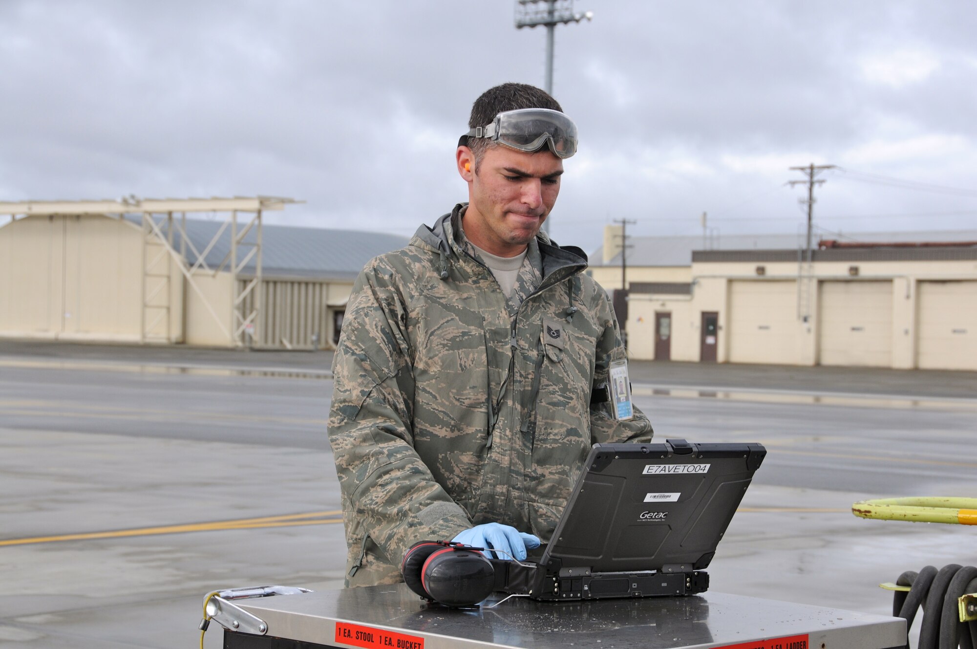 Tech. Sgt. David Pittari, reviews technical orders while waiting for the F-15s to return from a training mission while deployed to Joint Base Elmendorf-Richardson, Alaska in support of a training exercise. (U.S. Air Force Photo by: Technical Sergeant, Anthony M. Mutti)