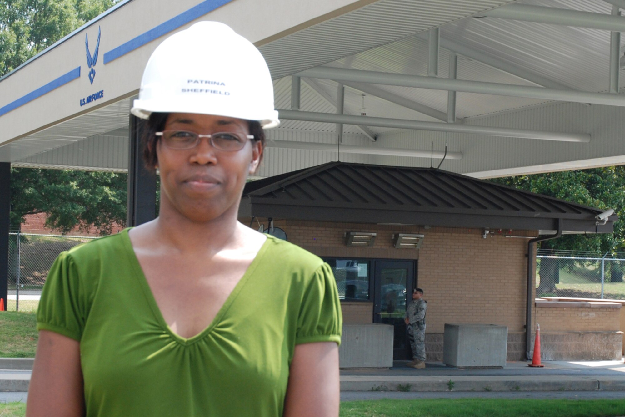 Patrina Sheffield, Dobbins’ contracting specialist and Air Force Reservist, administered the construction contract for the newly installed canopy at the Dobbins’ main gate. Sheffield is also the first sergeant for the 94th Maintenance Squadron. “One of the most rewarding things about being in the Air Force Reserve is that I have the opportunity to meet new people, travel, and assist in the development of our Airmen.” Sheffield said. (U.S. Air Force photo/Master Sgt. James Branch)