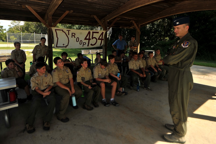 Valdosta Boy Scouts from Troop 454 listen to U.S. Air Force Col. Billy Thompson, 23rd Wing commander talk about being a military pilot at Moody Air Force Base, Ga., July 31, 2011. During their overnight visit, the Scouts earned aviation merit badges, one of the original 57 badges established by the Boy Scouts of America in 1911. (U.S. Air Force photo by Airman 1st Class Joshua Green/Released)
