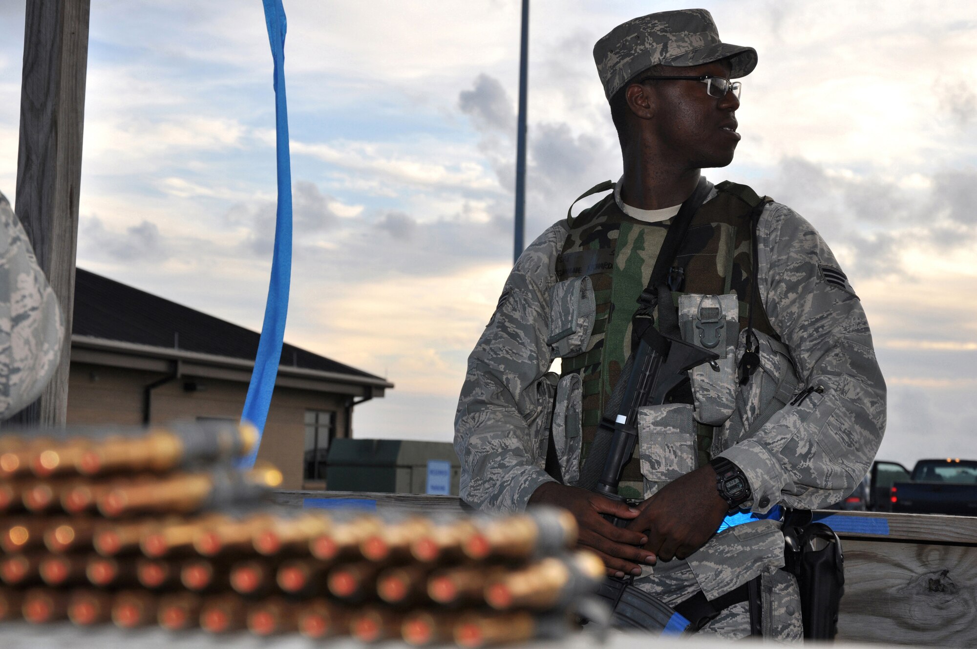 Senior Airman Desimone Richardson, 315th Airlift Wing, stands guard at an entry control point during the Operational Readiness Exercise at Gulfport Training Center, Miss., July 29. (U.S. Air Force photo/Tech. Sgt. Scott Mathews)