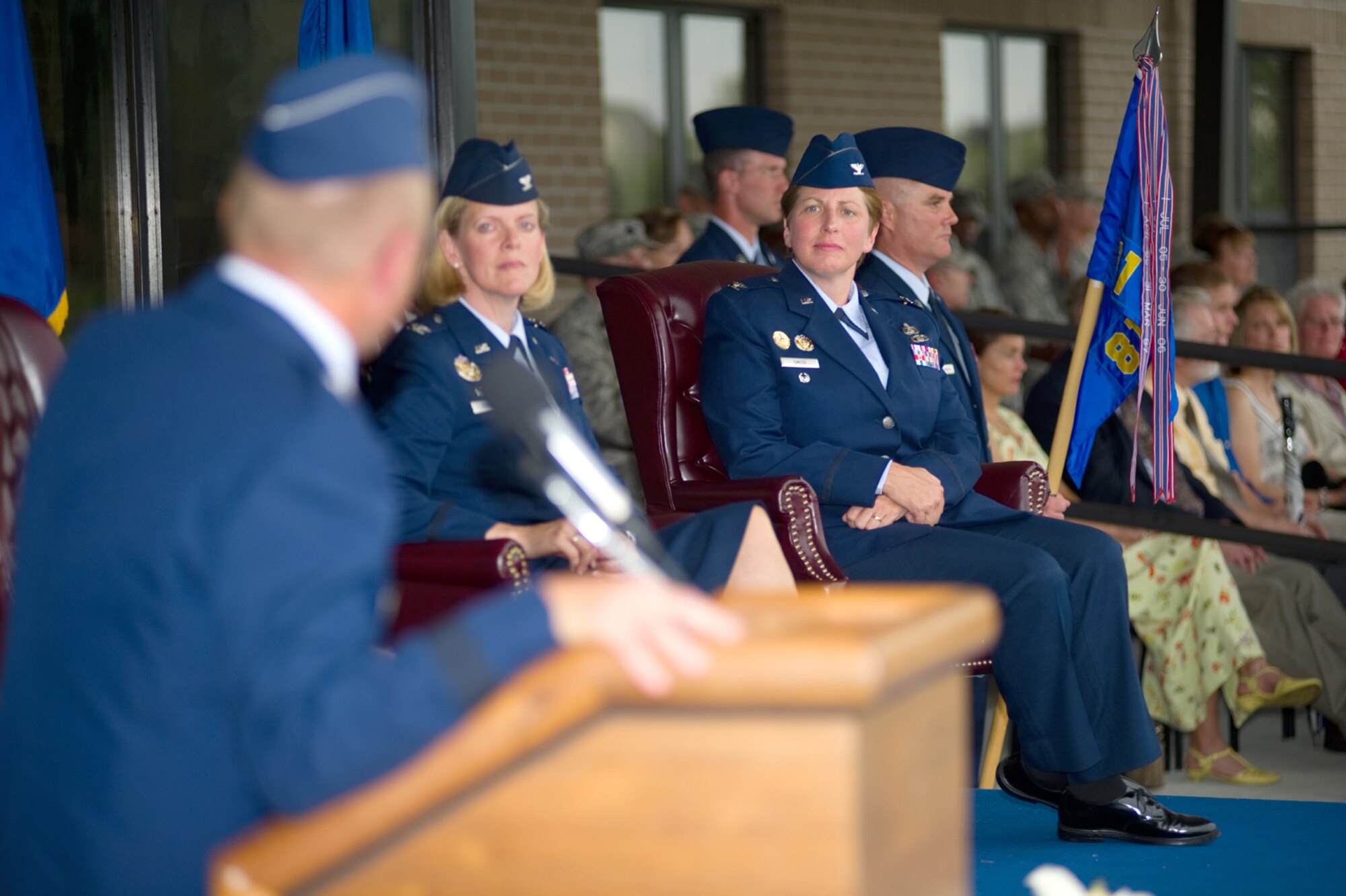 Brig. Gen. Andrew Mueller, left, 81st Training Wing commander, gives remarks during the 81st Training Group change of command ceremony July 28 on the parade field before Col. Lynn Connett turns over command of the 81st TRG to Col. Maureen Smith.  Smith is a recent graduate of the Industrial College of the Armed Forces,
Fort McNair, Washington, D.C.  Connett returns to the Pentagon as deputy director for
manpower and personnel plans and integration for the Air Staff.  (U.S. Air Force photo by Adam Bond)