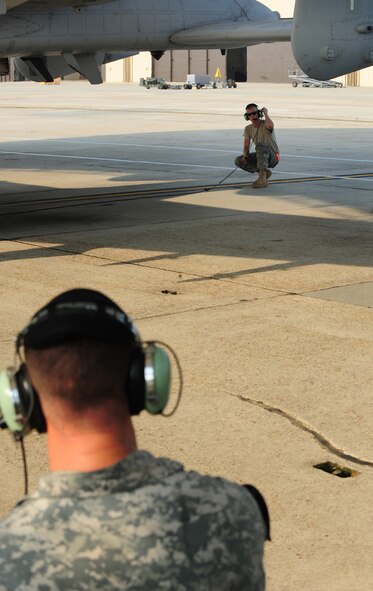 U.S. Air Force Staff Sgt. Kevin Donovan, 23rd Aircraft Maintenance Squadron crew chief, observes Airman 1st Class Eric Eckmann, 23rd AMXS crew chief, as he inspects the tail of an A-10C Thunderbolt II at Moody Air Force Base, Ga., Aug. 3, 2011. Crew chief technical training school is about six- months long and covers maintenance of the aircraft structures, systems and components. (U.S. Air Force photo by Senior Airman Stephanie Mancha/Released)
