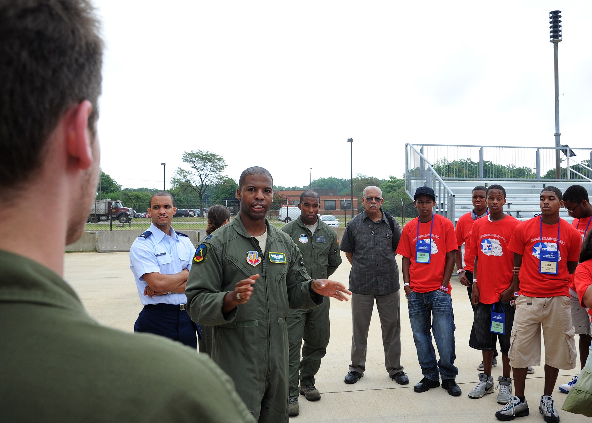 Capt. Keyatta Ruffin, 712th Air Support Operations Squadron air liaison officer and F-16 pilot, speaks to youth about his career in aviation during the 2011 Tuskegee Airmen, Inc. National Convention Youth Day at Joint Base Andrews, Md., Aug. 4. Ruffin has been flying since the age of thirteen thanks to a youth program sponsored by the Tuskegee Airmen. He received his instructor pilot license at the age of 18 with more than 125 flight hours, prior to becoming a student at the Air Force Academy. (U.S. Air Force photo/ Staff Sgt. Nichelle Anderson)