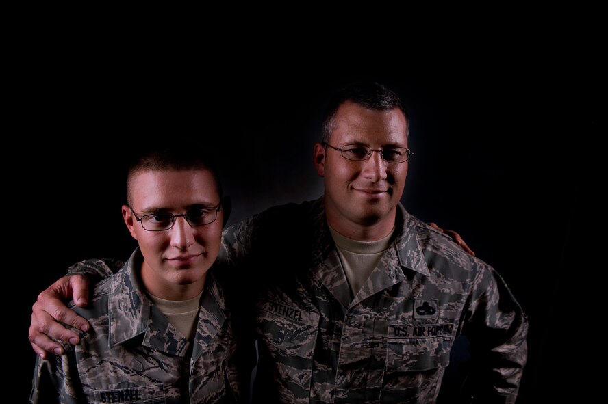 Master Sgt. Mark Stenzel and his son, Airman 1st Class Cory Stenzel are pictured together July 27, 2011, at Fairchild Air Force Base, Wash. They are both stationed at Fairchild after being apart for five months while Cory attended basic and technical school training. (U.S. Air Force Photo/Staff Sgt. Michael Means) 