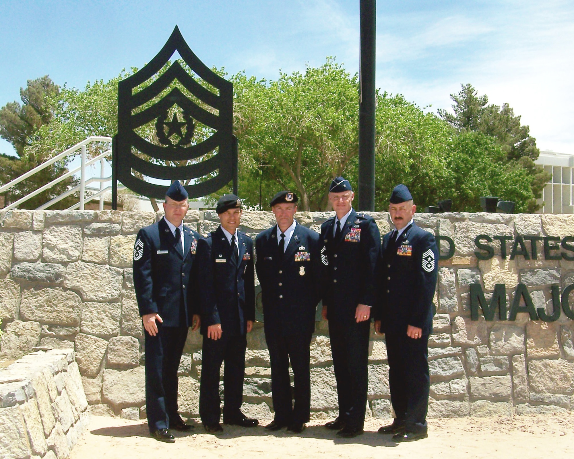 Senior Leaders of the Oregon Air National Guard pose for a group post-graduation photograph with Senior Master Sgt. Christopher Roper (center), after his graduation ceremony from the U.S. Army Sergeants Major academy on June 17, 2010 at Ft. Bliss, Tex.  Senior Master Sgt. Roper was the first Air National Guard member to graduate from the U.S. Army Sergeants Major academy. With Roper are (left to right) Command Chief Master Sgt. James Hotaling, 142nd Fighter Wing Command Chief,  Major Frank Page, Security Forces Commander 142nd Fighter Wing, Senior Master Sgt. Christopher Roper, Brig. General Stephen Gregg, Oregon Air National Guard Commander and Command Chief Master Sgt. Mark Russell, Oregon Air Guard State Command Chief. (Photograph courtesy of Senior Master Sgt. Christopher Roper)