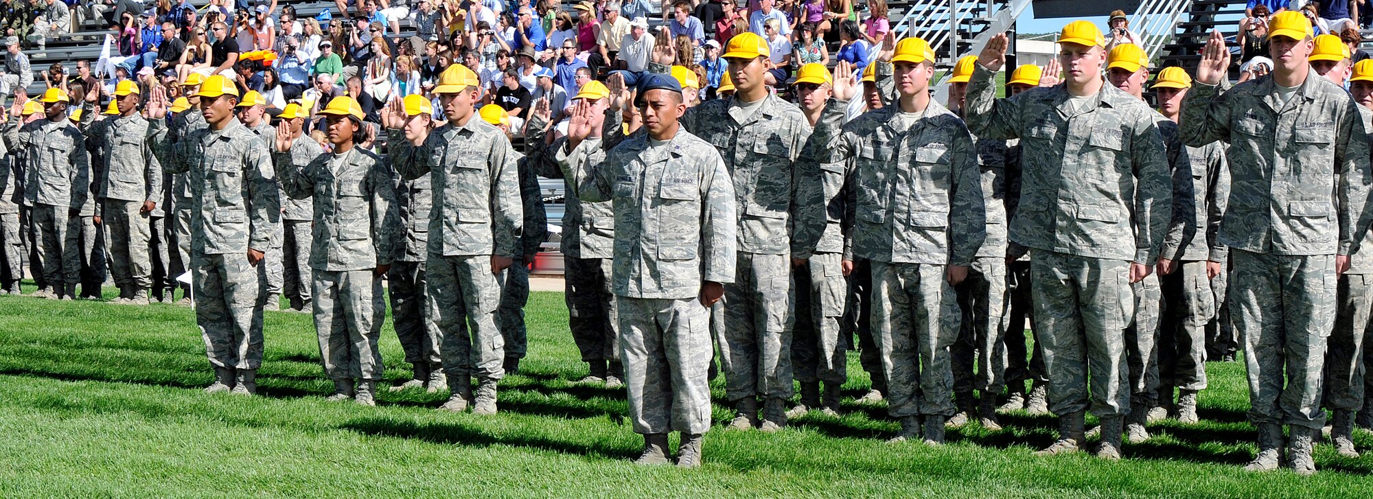 Members of the Air Force Academy's Class of 2015 take the Honor Oath during the Academy's Acceptance Day Parade Aug. 3, 2011. Cadets may not lie, steal or cheat, nor tolerate among their ranks anyone who does. In addition, they swear to do their duty and to live honorably. (U.S. Air Force photo/Megan Davis)