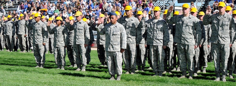 Members of the Air Force Academy's Class of 2015 take the Honor Oath during the Academy's Acceptance Day Parade Aug. 3, 2011. Cadets may not lie, steal or cheat, nor tolerate among their ranks anyone who does. In addition, they swear to do their duty and to live honorably. (U.S. Air Force photo/Megan Davis)
