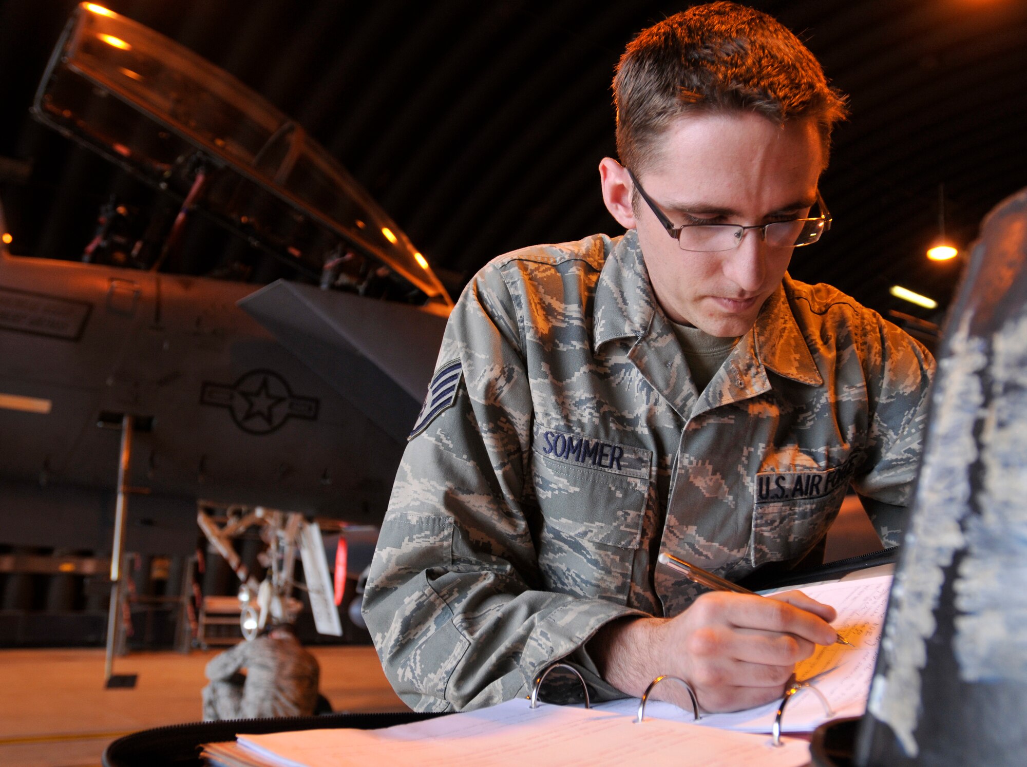 ROYAL AIR FORCE LAKENHEATH, England - Staff Sgt. Michael Sommer, 48th Equipment Maintenance Squadron Nondestructive Inspection journeyman, annotates the results of an aircraft inspection at RAF Lakenheath, Aug. 2, 2011. Airmen from the NDI are responsible for finding the smallest aircraft defects so they can be repaired to prevent larger problems. (U.S. Air Force photo/Senior Airman Tiffany M. Deuel)