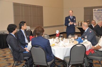 OMAHA, Neb. - Gen. C. Robert Kehler, U.S. Strategic Command commander, has a discussion with foreign attendees during the 2011 USSTRATCOM Command Deterrence Symposium August 4 at the Qwest Center.