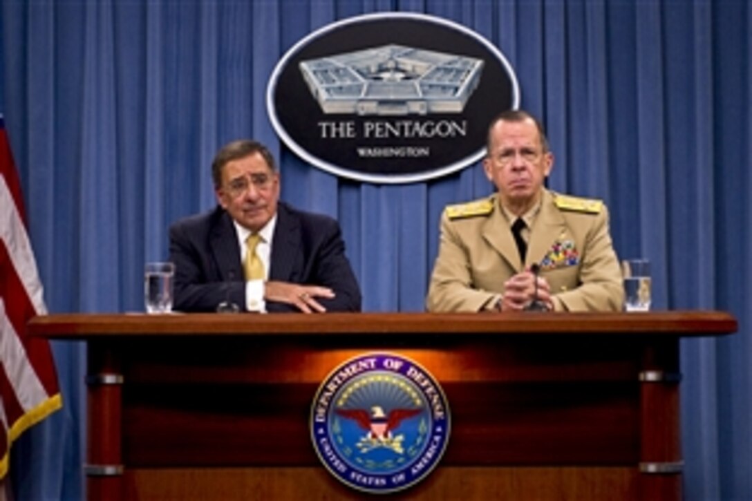 Defense Secretary Leon E. Panetta and Navy Adm. Mike Mullen, chairman of the Joint Chiefs of Staff, address the media during a press conference at the Pentagon, Aug. 4, 2011. The defense leaders focused on debt reduction issues. It was Panetta's first Pentagon press conference since he was sworn in as defense secretary July 1.