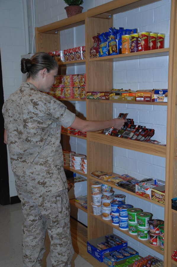 1st Lt. Sarah Ray, adjutant, Marine Corps Logistics Base Albany, looks at the variety of snack items available in the Building 3500 snack bar, Aug. 5.
