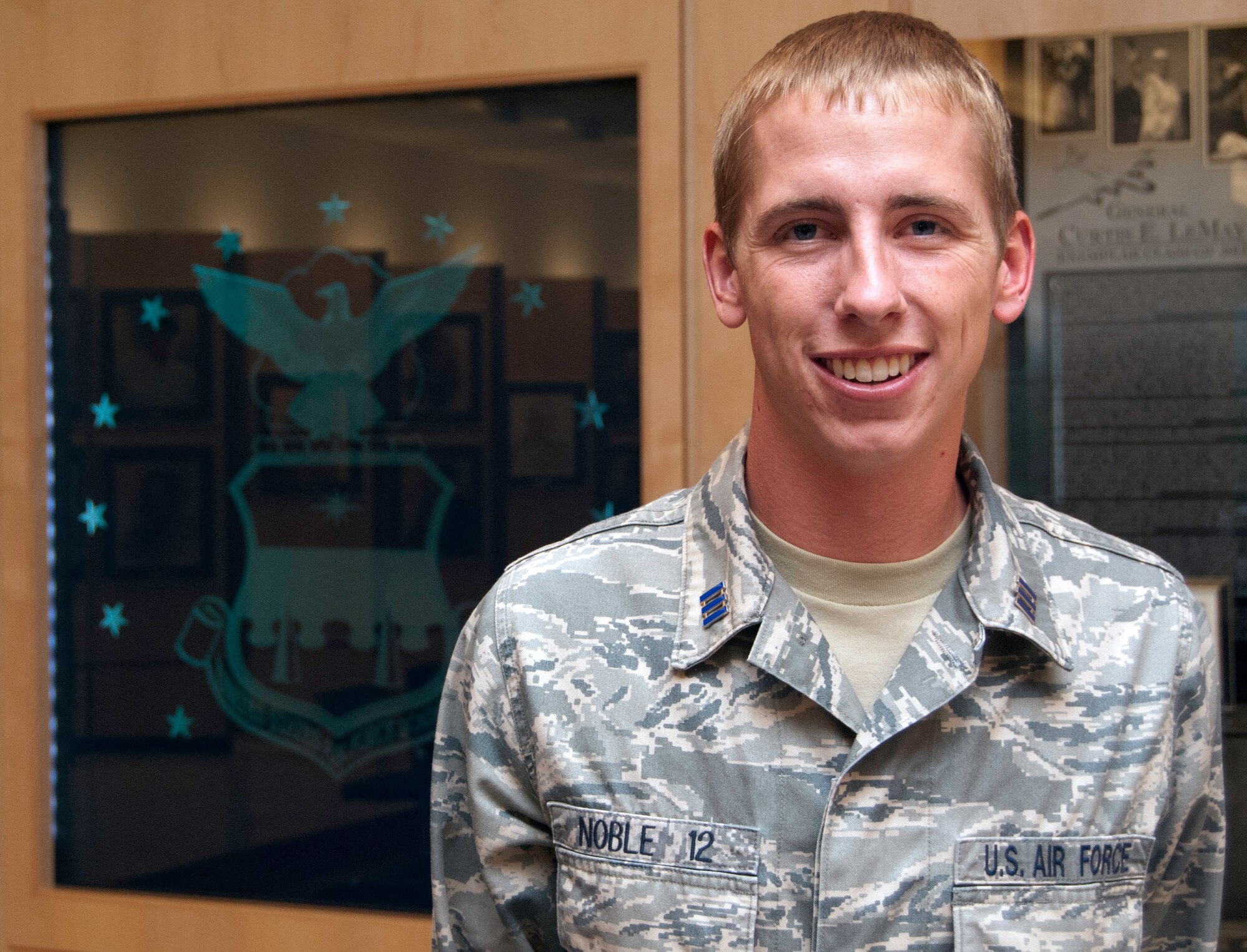 Cadet 1st Class Joel Noble helped Airmen with the 379th Expeditionary Maintenance Squadron in Southwest Asia quickly repair a B-1B Lancer that could not fly due to a failed entry hatch bailout rocket while shadowing the squadron as part of Operation Air Force in July 2011. He is a native of Springboro, Ohio, and is assigned to Cadet Squadron 14 at the Air Force Academy in Colorado Springs, Colo. (U.S. Air Force photo/Don Branum)