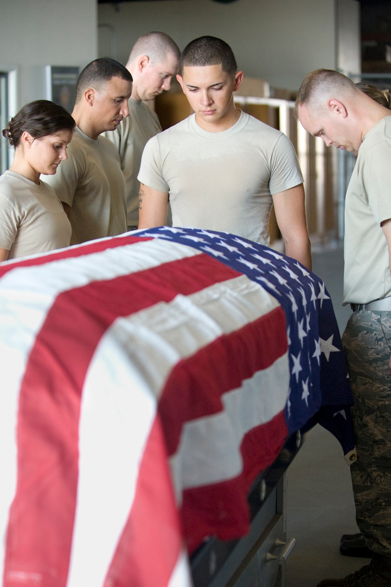 PATRICK AIR FORCE BASE, Fla. -- Patrick Honor Guard members train for a military funeral detail. HG is made up of volunteer members representing various Air Force units on Patrick AFB and Cape Canaveral AFS, who serve on one of three rotating flights, for one year minimum. Getting these Airmen trained and keeping them consistently sharp is a time-consuming, behind-the-scenes effort of HG Superintendent Master Sgt. Kevin Matthews and a team of professional full-time staff members, who augment, conduct day-to-day operations, training and assist with details. (U.S. Air Force photo by Julie Dayringer)