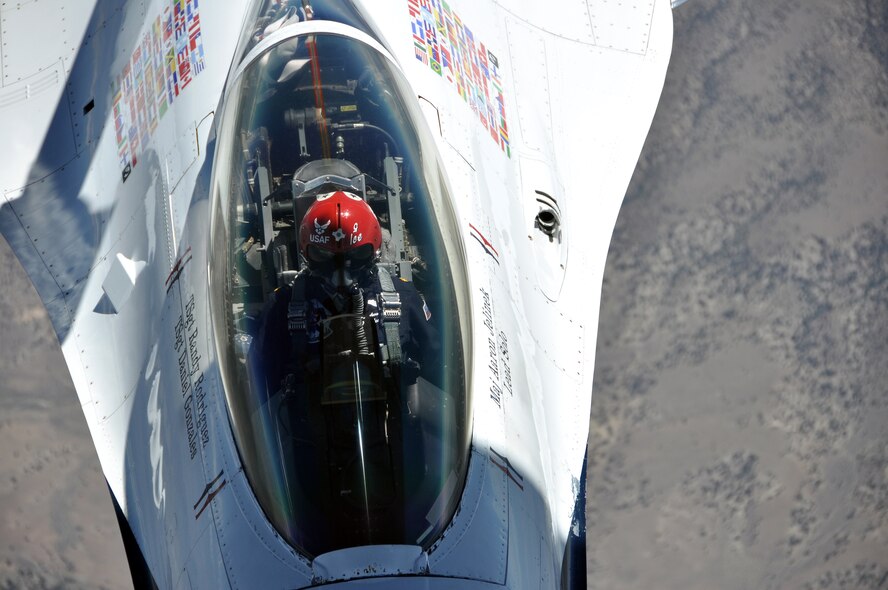 U.S. Air Force Thunderbird #5, lead solo Major Aaron Jelinek, approaches a Team Travis KC-10 Extender July 28, 2011 to receive fuel in-flight. In-flight refueling is a key component of Travis and ensures true global outreach. (U.S. Air Force photo/Airman 1st Class Joshua Crane)
