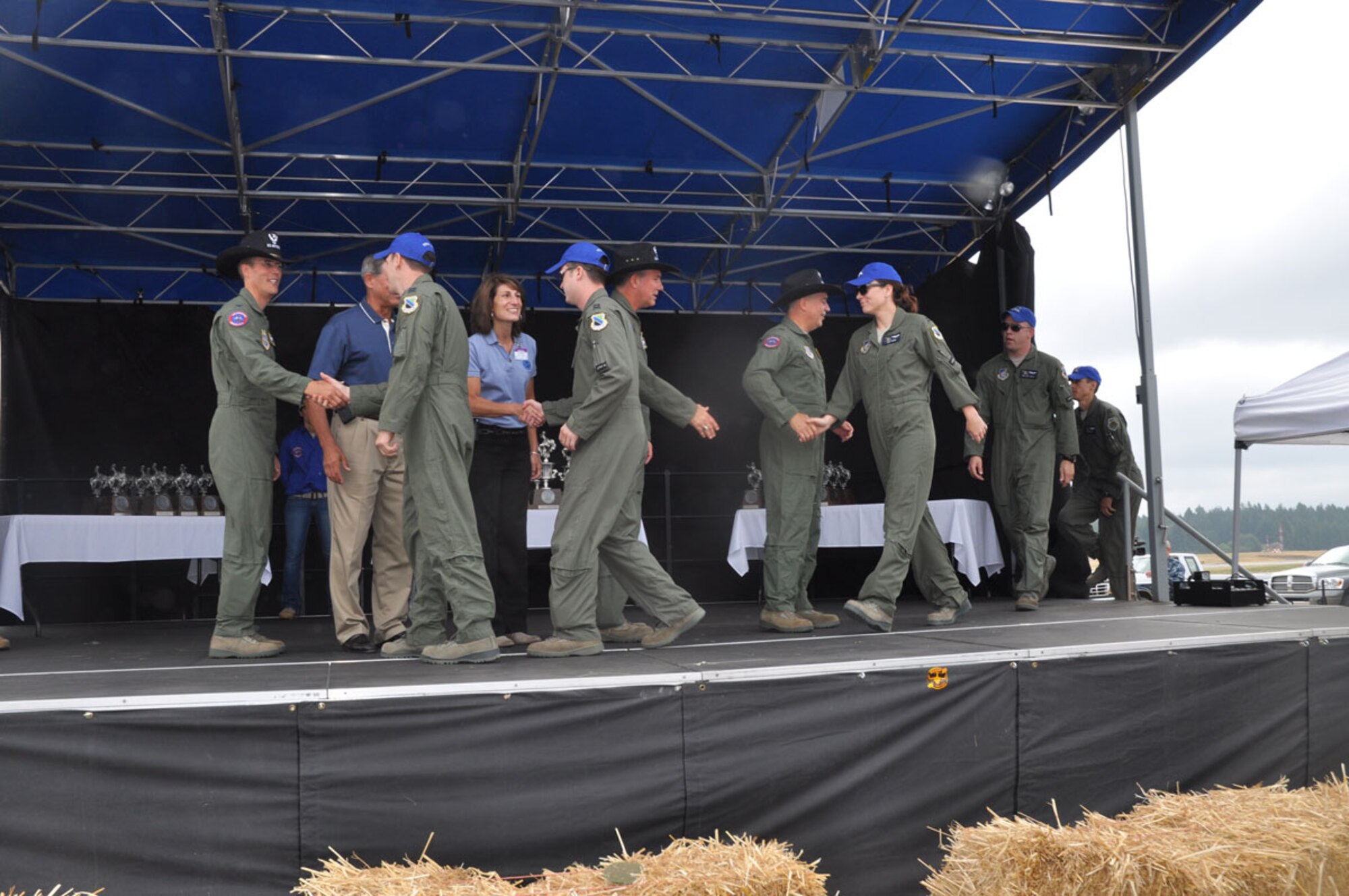 Team Alaska crewmembers from the 517th Airlift Squadron, take the stage to accept the award for Best Airdrop Crew during the 2011 Air Mobility Command Rodeo at Joint Base Lewis-McChord, Wash, July 29.   (U.S. Air Force photo/Capt. Corinna Jones)
